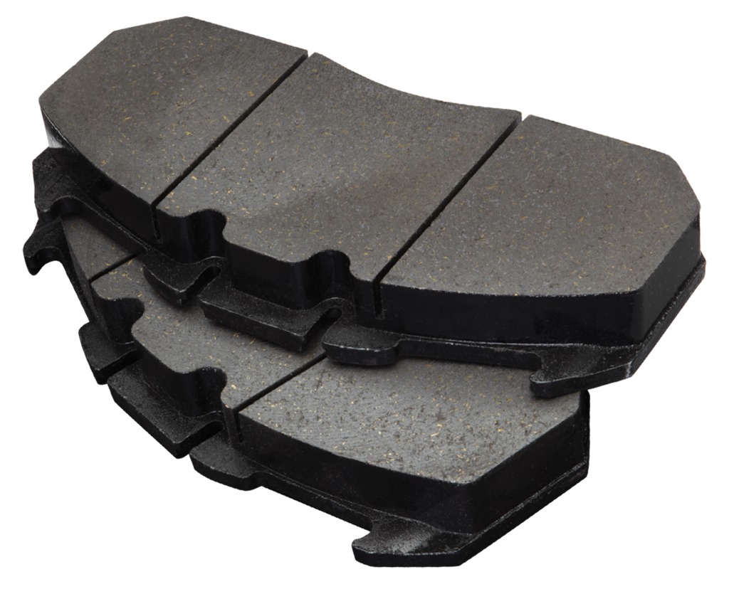 Stacked semi-metallic brake pads